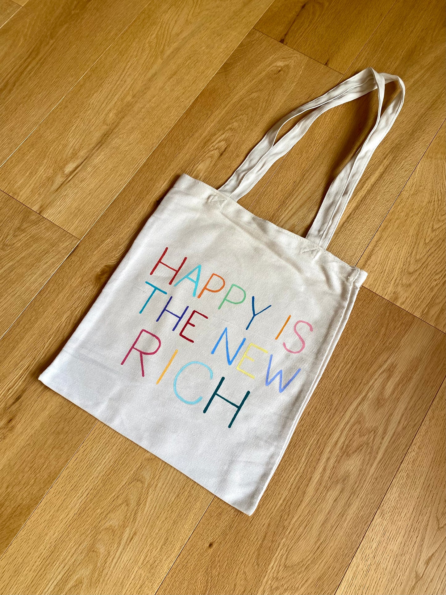 Happy is the New Rich Tote Bag