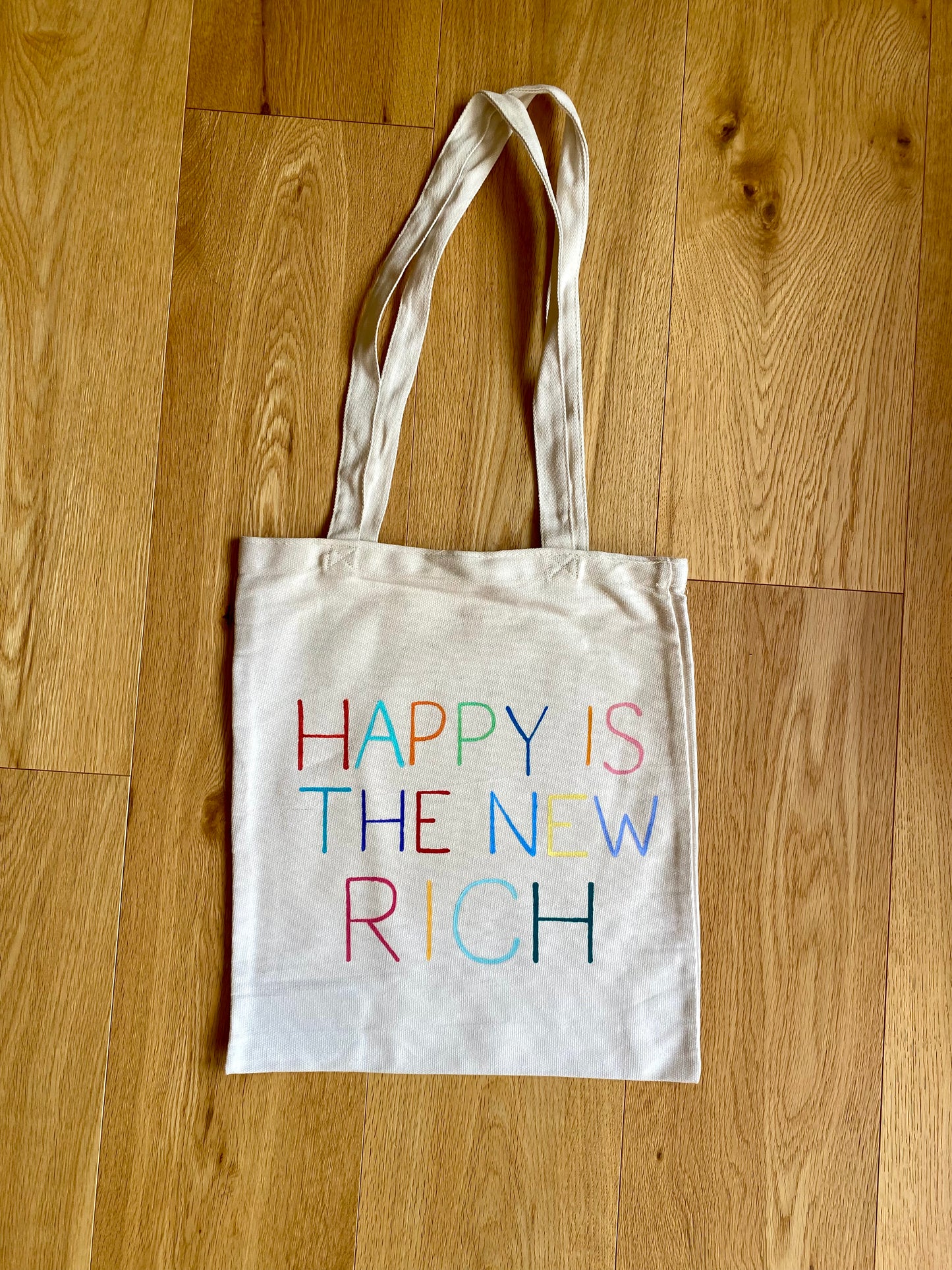 Happy is the New Rich Tote Bag