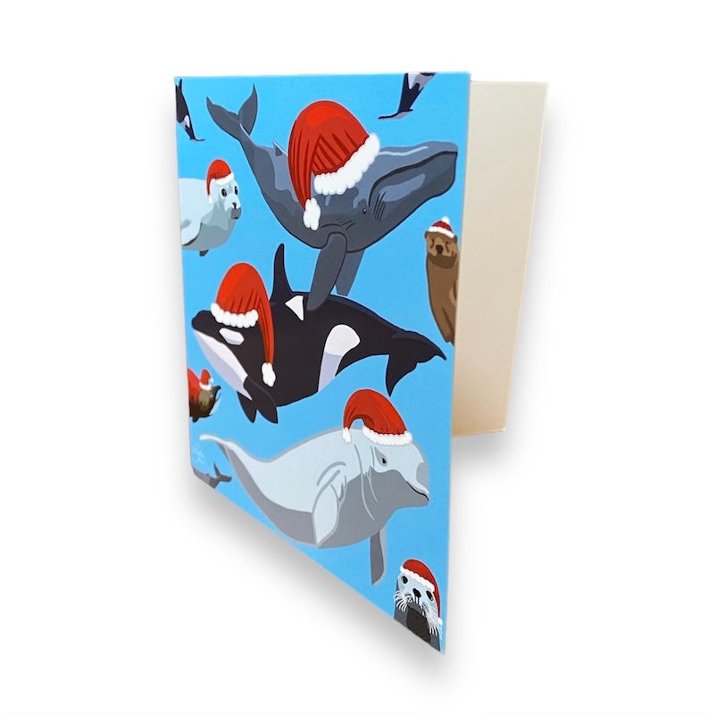 Tarjeta de Navidad del océano: animales marinos con gorros de Papá Noel